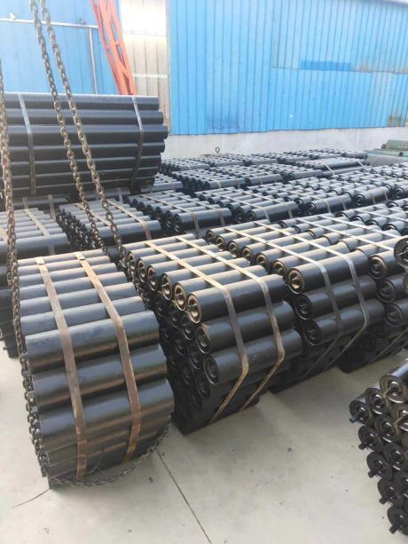 Black steel conveyor idlers ready for shipment