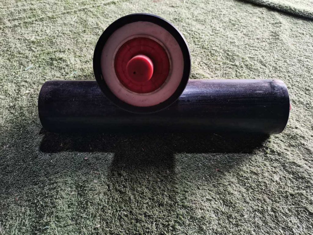 Black polymer conveyor roller with red shaft end