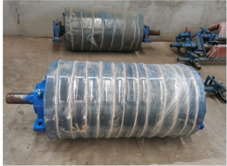 Two rubber lagging pulleys for bulk material handling conveyor
