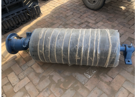 Custom rubber lagging pulley with shaft and bearing seat